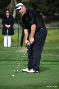 Bruce Bochy puts for par on the second hole at Pebble Beach