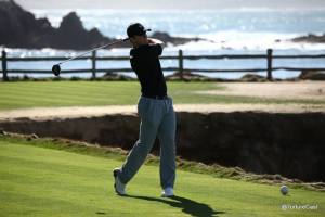 Buster Posey tees off on the 18th hole at Pebble Beach.