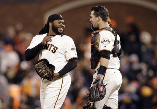 Johnny Cueto and Buster Posey of the San Francisco Giants